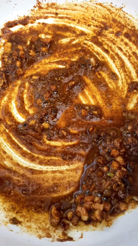 Stewing the spices for the base of the tofu pasta sauce.