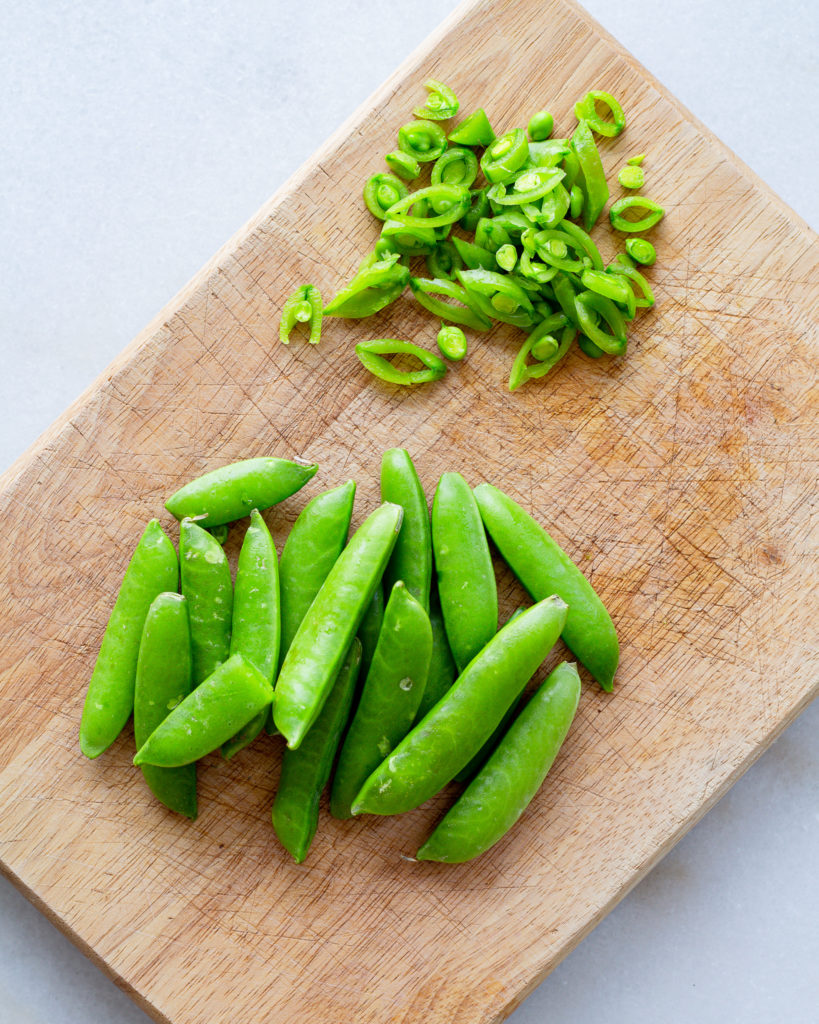 whole and sliced snap peas