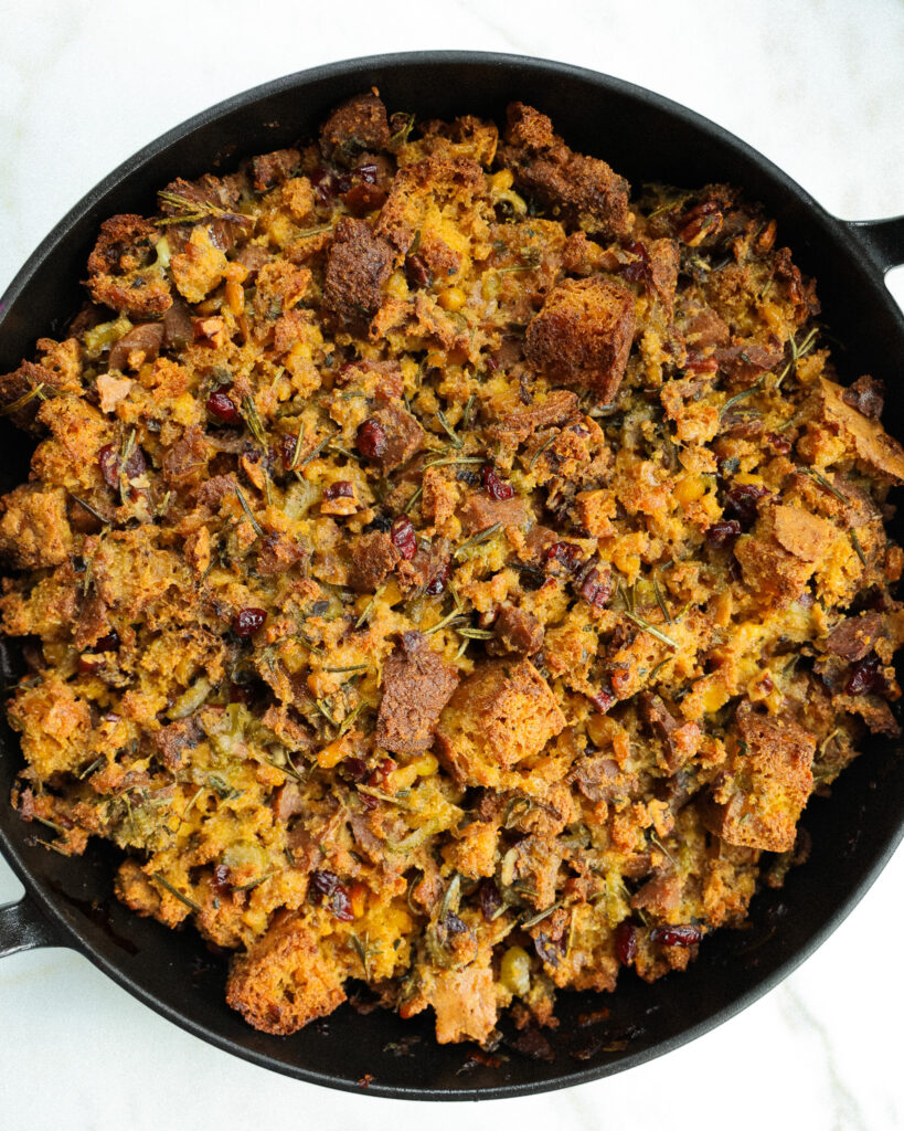 Vegetarian Cornbread and cranberry stuffing in a skillet