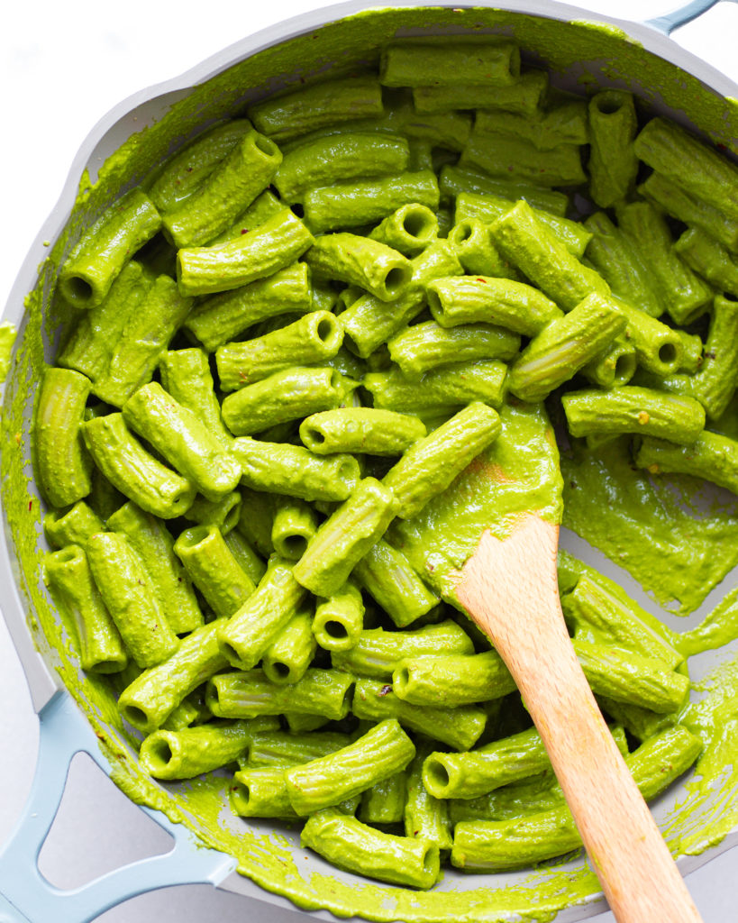kale tahini sauce on different pasta shape