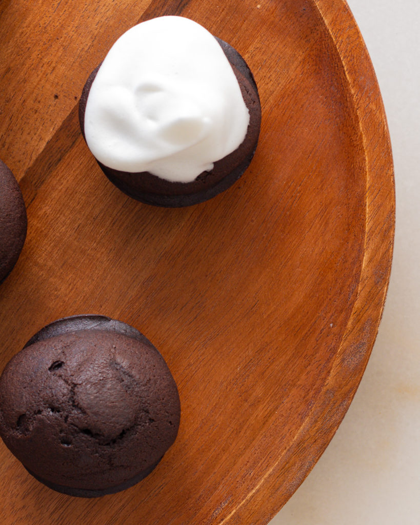 whipped topping on cupcake
