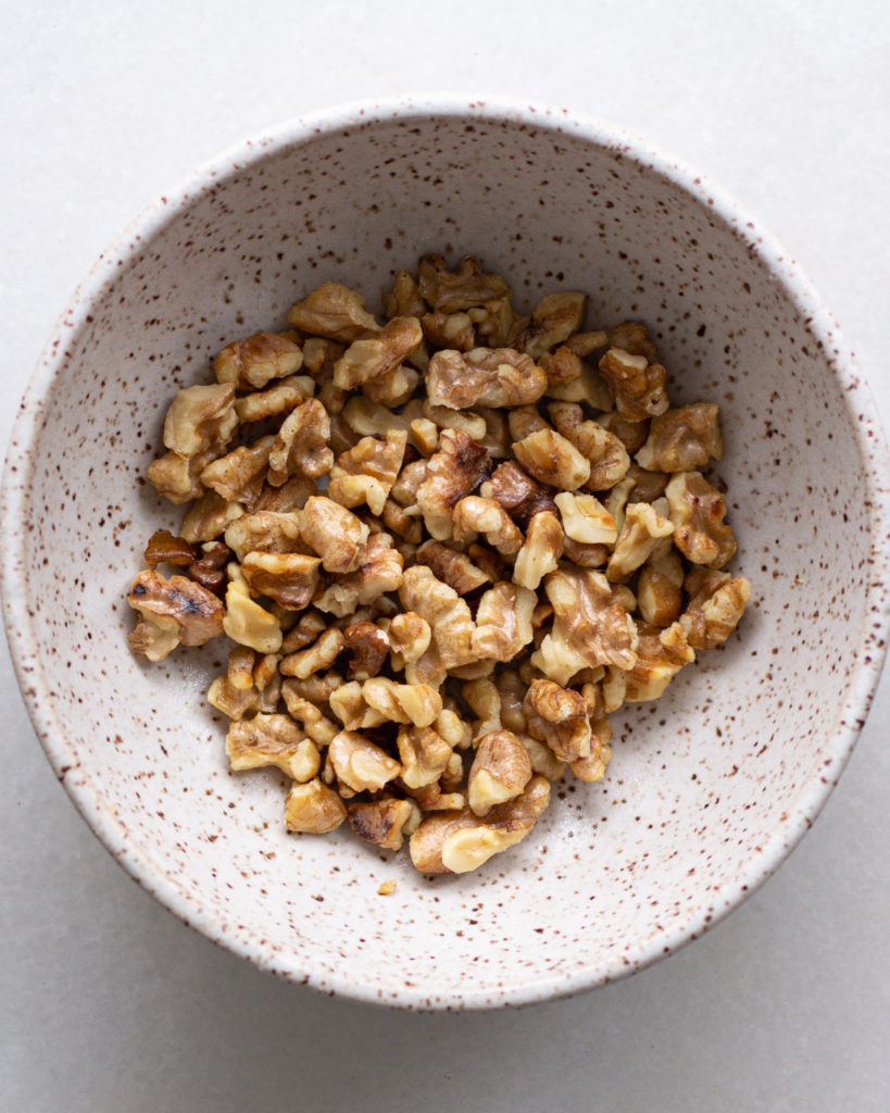 Chopped walnuts in bowl