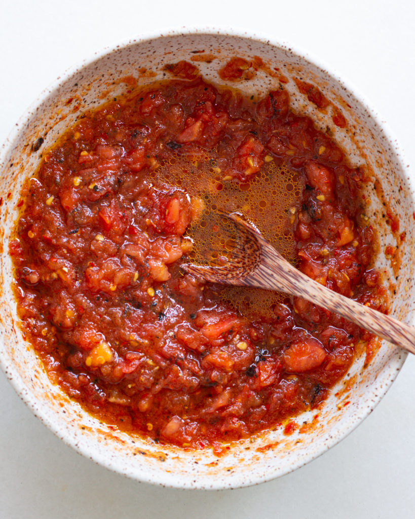 Blistered Tomato Dressing well combined in bowl