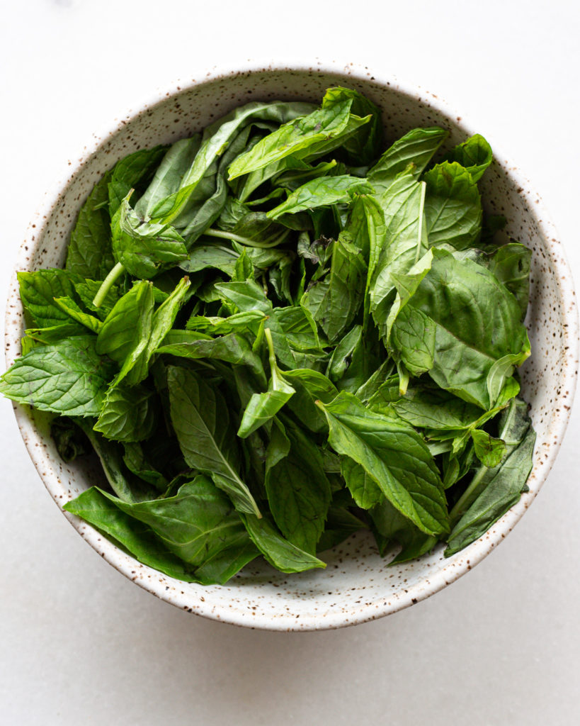 mint and basil in bowl
