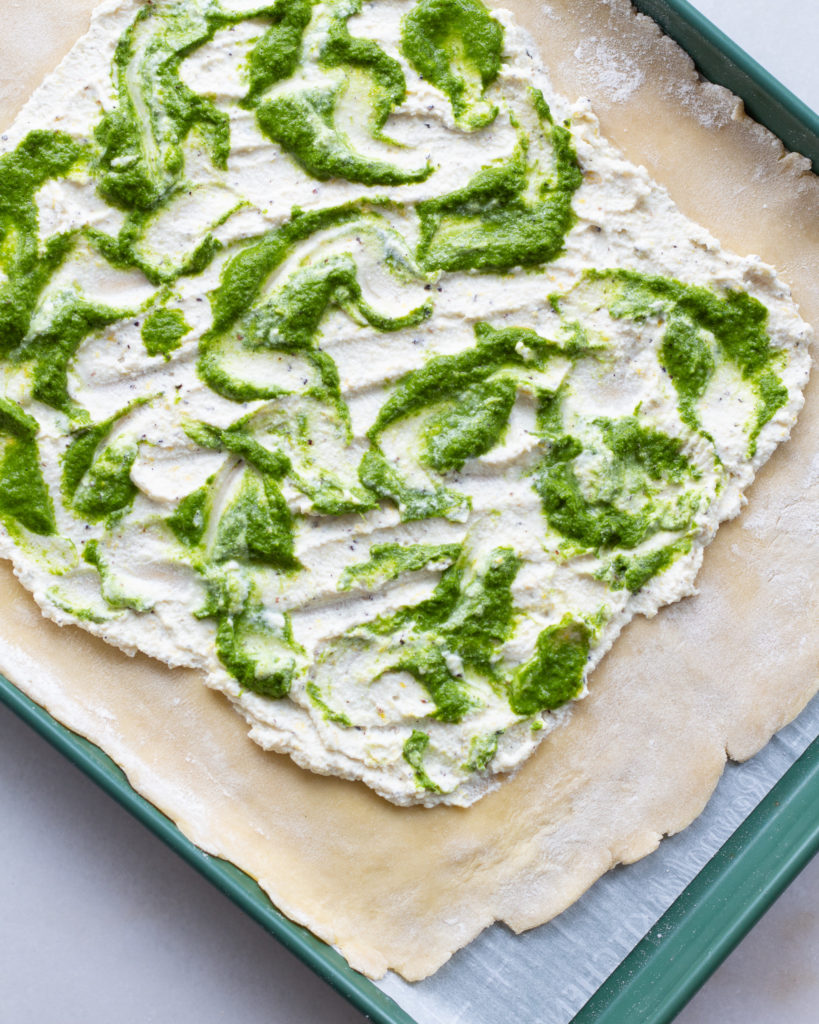 Parsley sauce added to ricotta and puff pastry