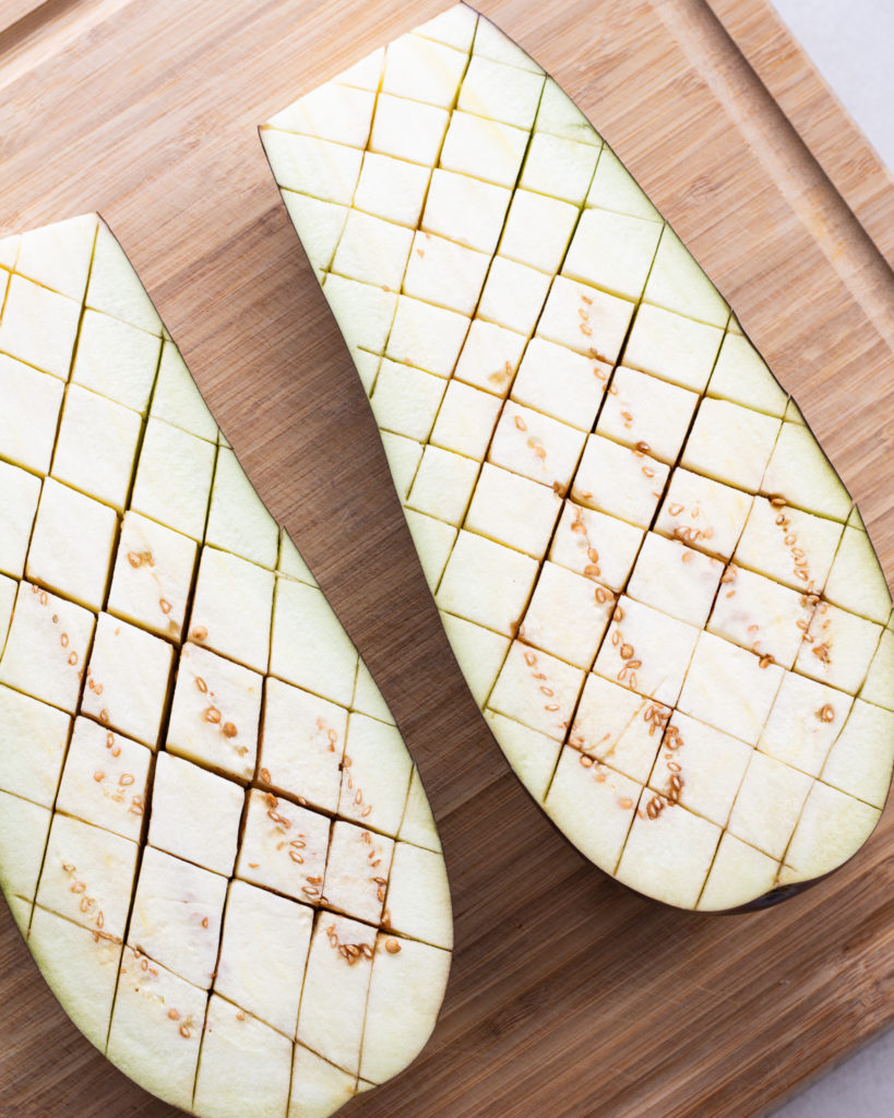 Raw eggplant, scored