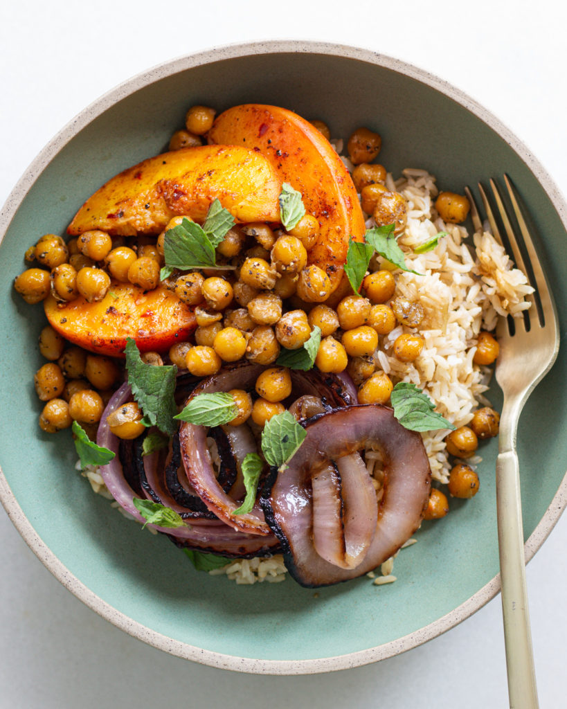 Finished Crispy Chickpea Bowl with Spiced Peaches & Red Onions
