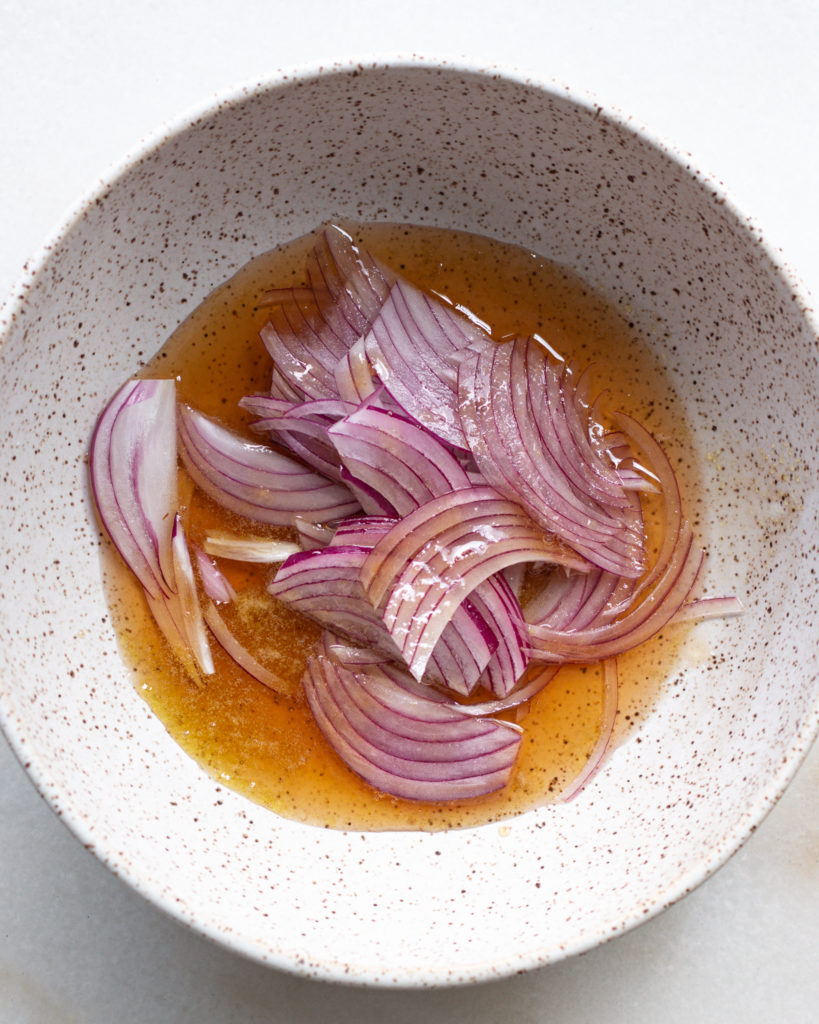 Agrodolce sauce over red onions