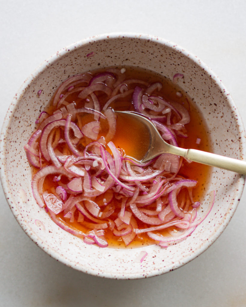 Pickled red onions in red wine vinegar