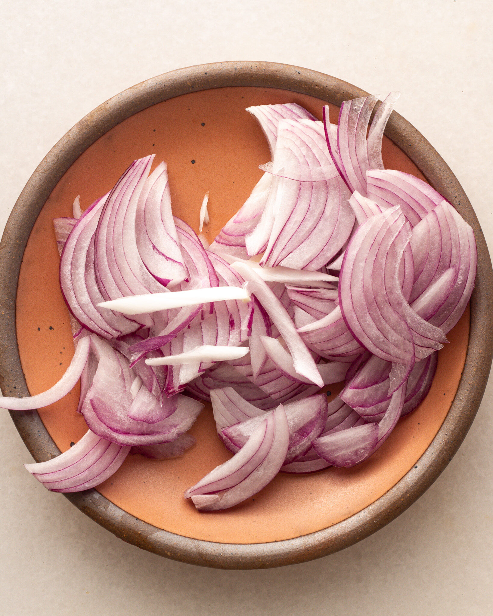 Sliced red onions