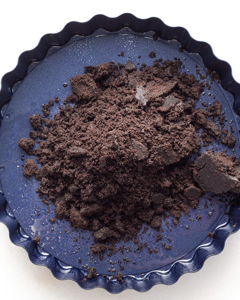 Oreo crumble in bottom of pan