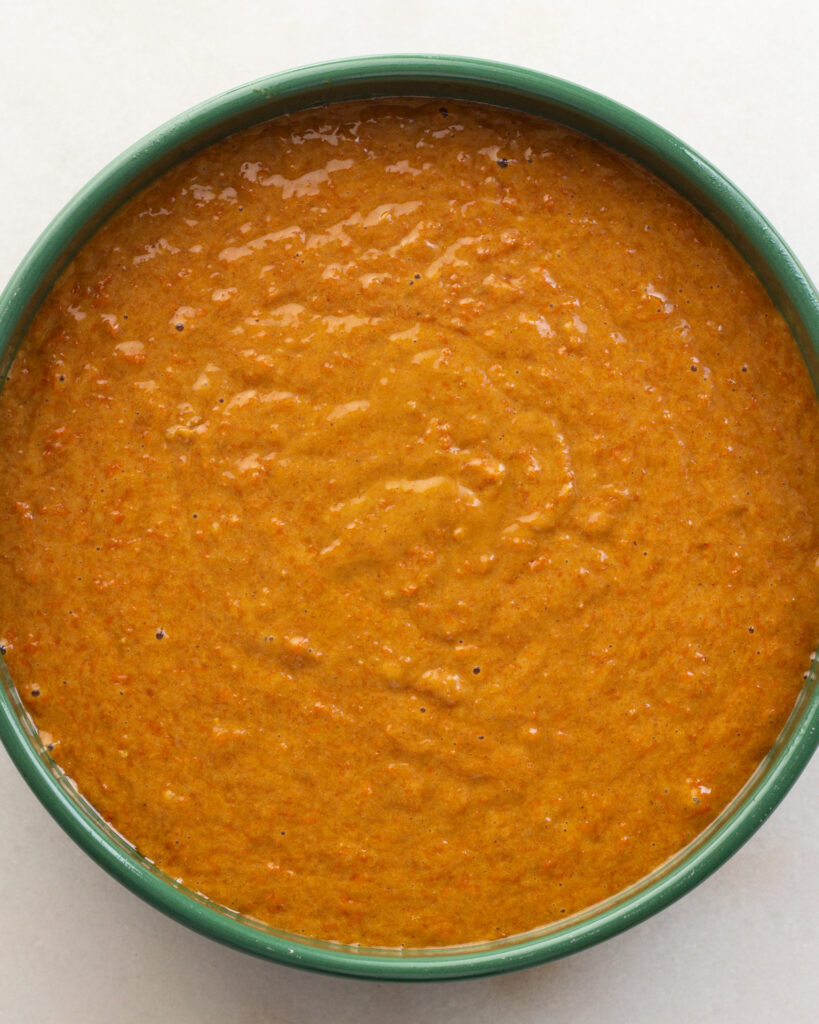 cake batter in a round baking dish