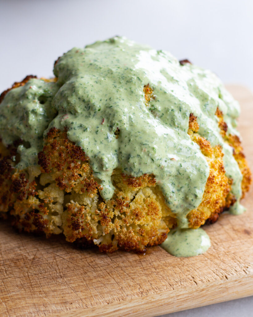 baked cauliflower with herby tahini dressing