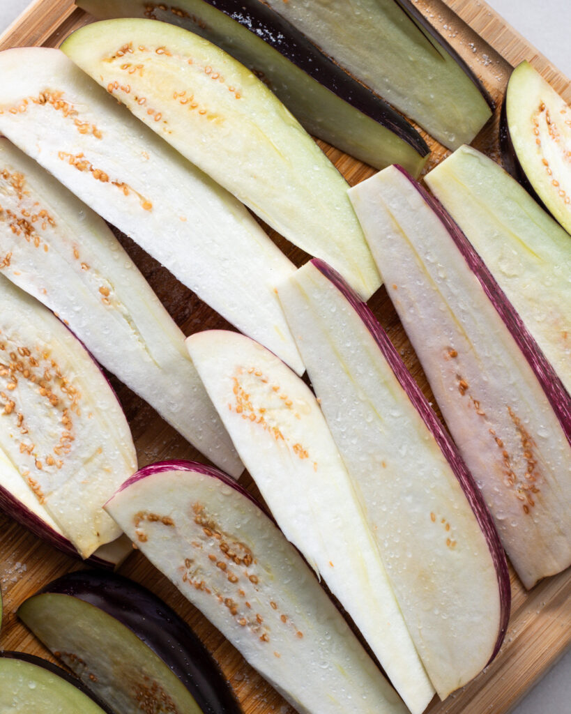 Raw sliced and salted eggplant