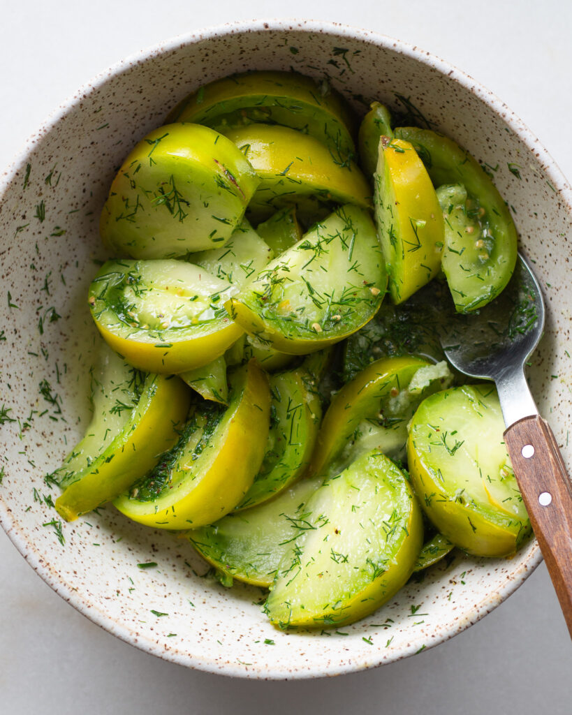 Finished green tomato salad with dill dressing