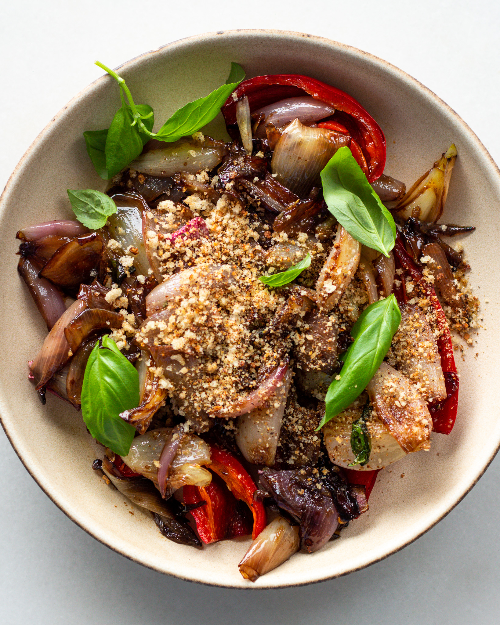 Finished sticky shallots with basil breadcrumbs
