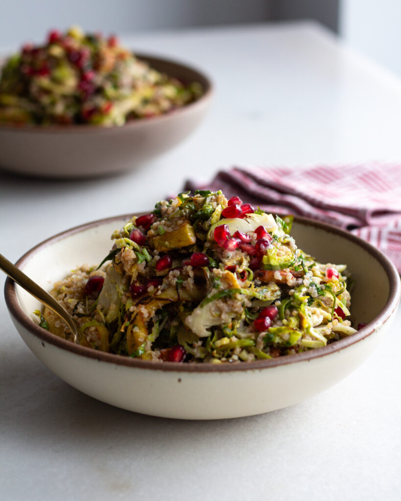 Finished Shaved Brussels Sprouts Salad with Pomegranate Dressing & Chili Almonds