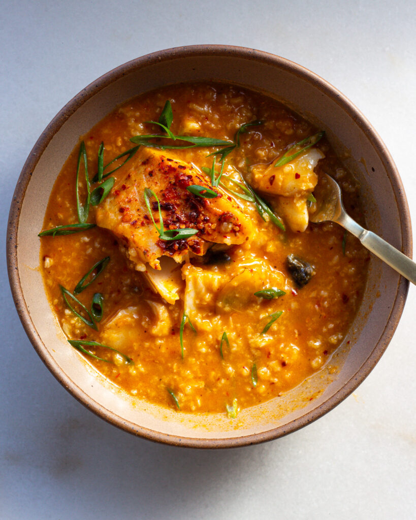 Finished Honeynut Squash Congee with Poached Fish