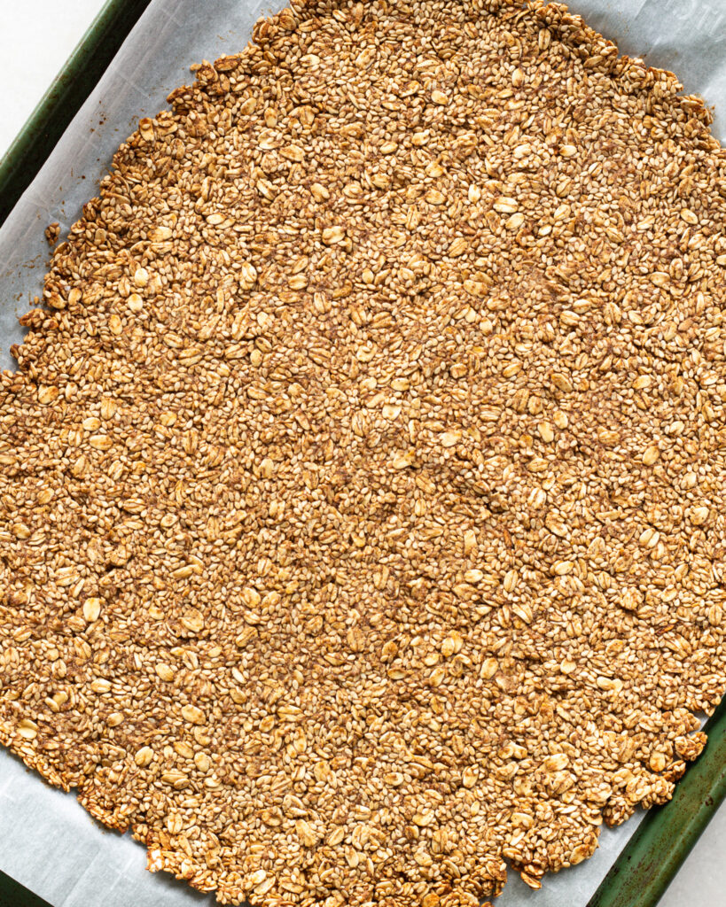 Five Spice Sesame Granola Bark on baking sheet