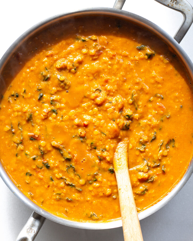 Sweet Potato Romesco Lentils in pan with kale