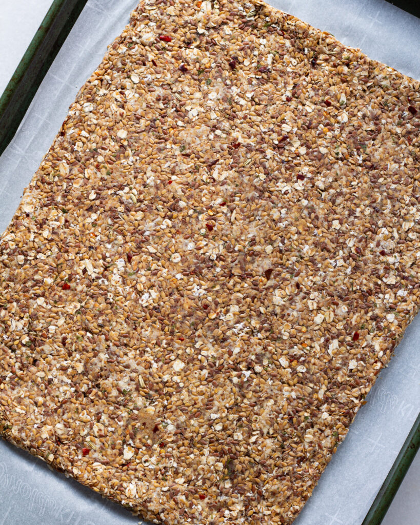 crackers rolled out on baking sheet