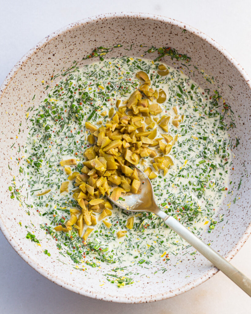 tuna salad dressing with chives, olives, and dill