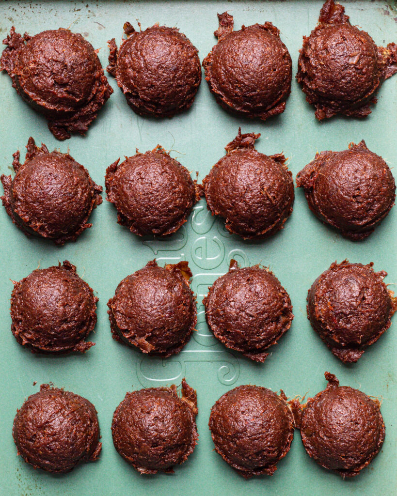 Portions of pumpkin spice brownie energy bites before being shaped and coated