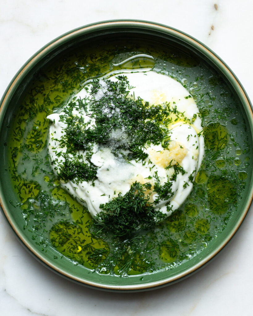 Garlicky skyr spread for a çilbir sandwich