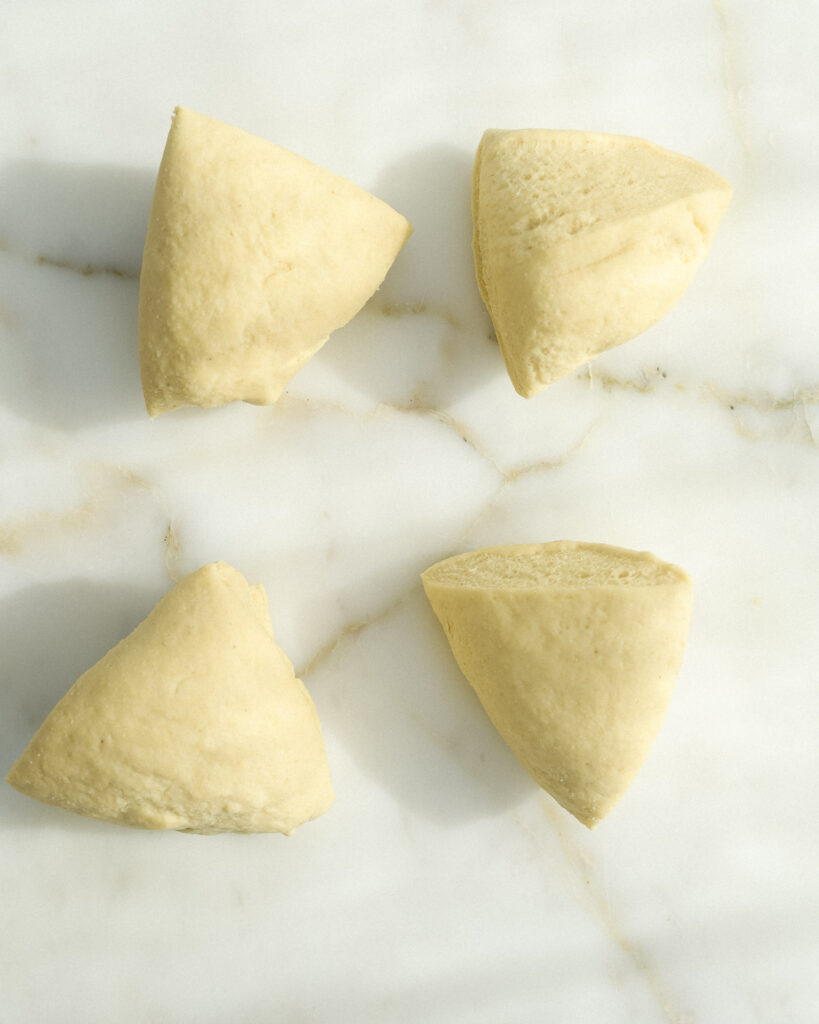 homemade pasta dough divided into 4