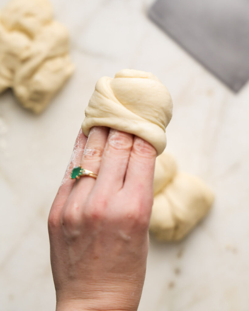 vegan brioche dough being shaped.