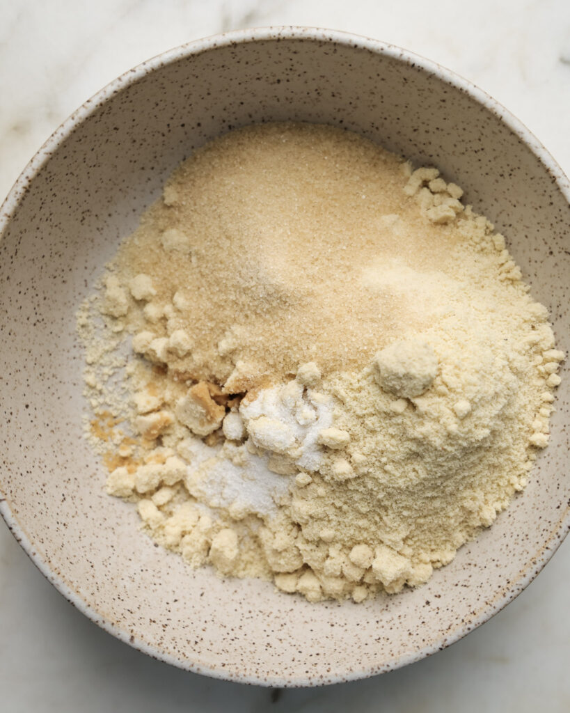 ingredients for edible sugar cookie dough in a bowl.