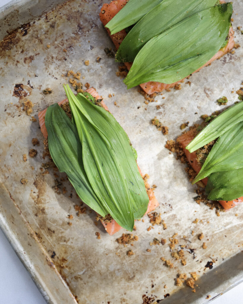 salmon fillets topped with ramps.