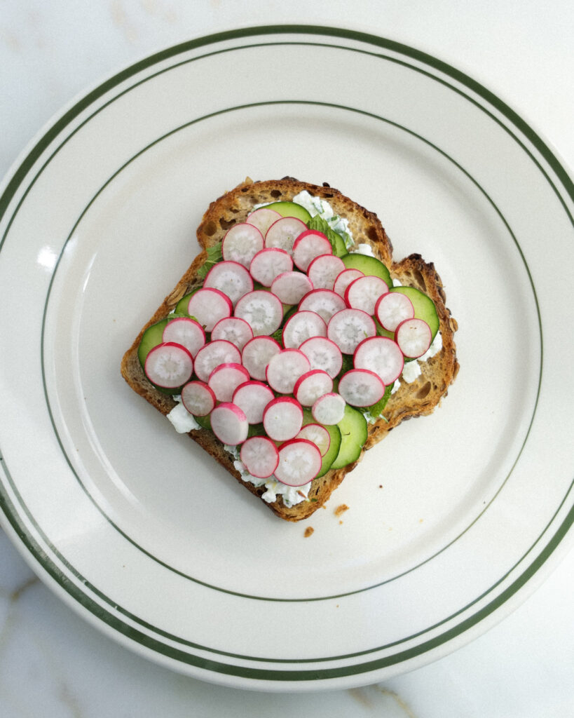 cucumbers, sliced radishes, mint and greek yogurt on toasted bread.