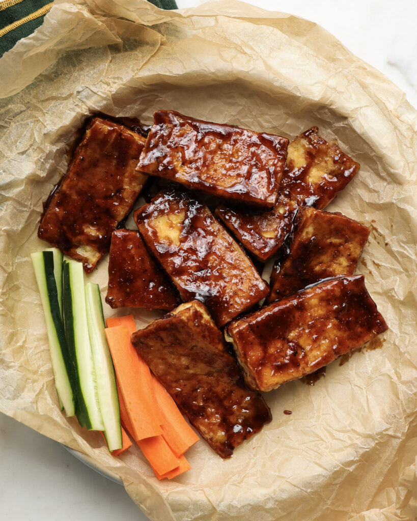 tofu chicken wings served with carrots and zucchini.