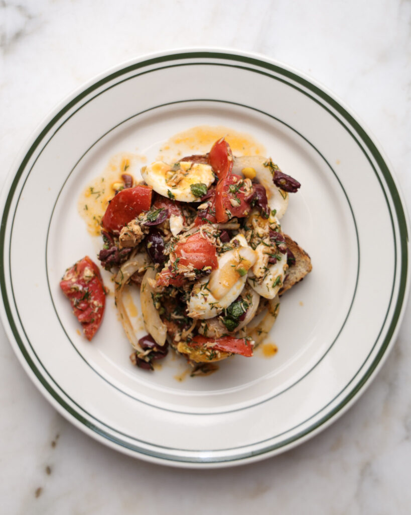 Summer tomato tuna salad on a plate.