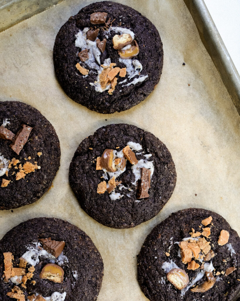baked death by chocolate cookies on a baking sheet.