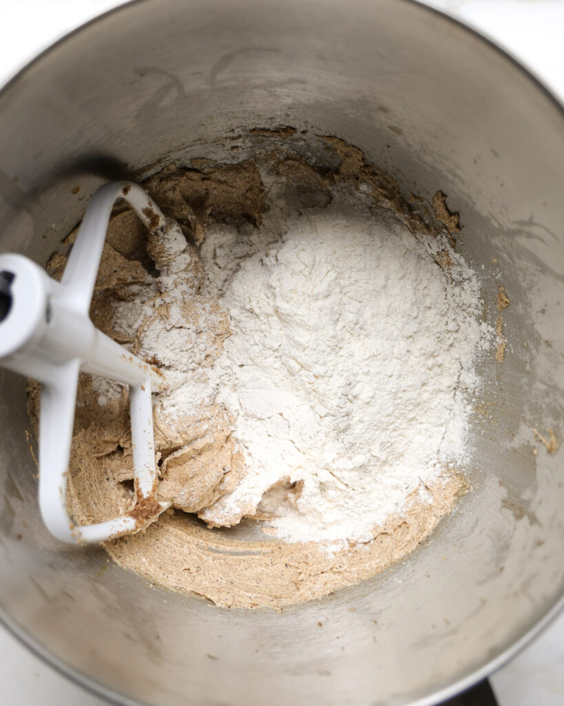 Dry ingredients being added to the wet ingredients.