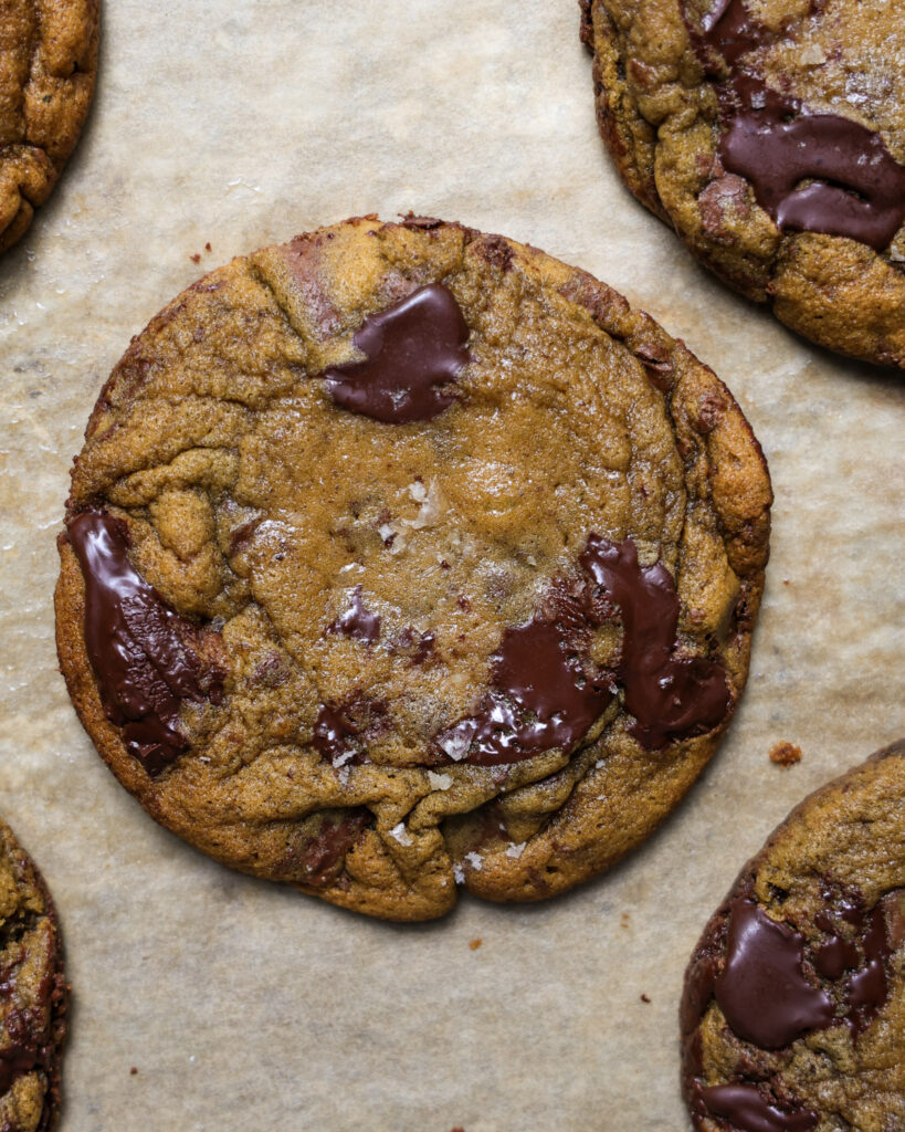 Pumpkin tangzhong cookies on parchment paper.