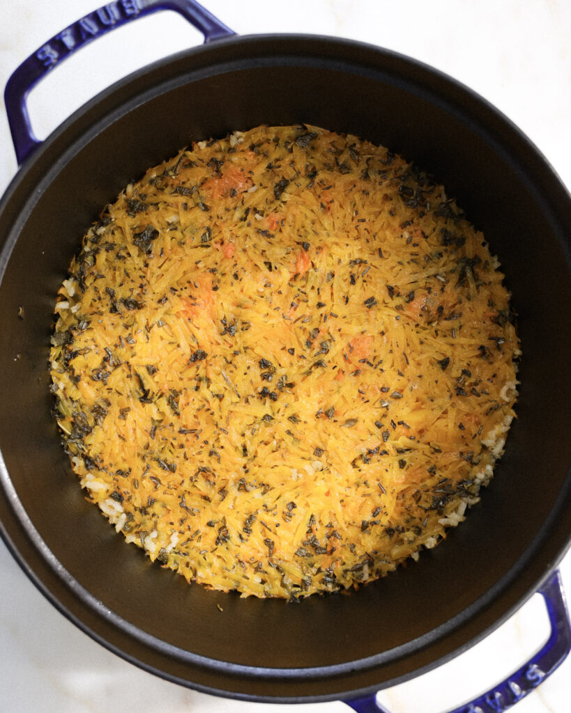 squash and arborio rice in a pot.